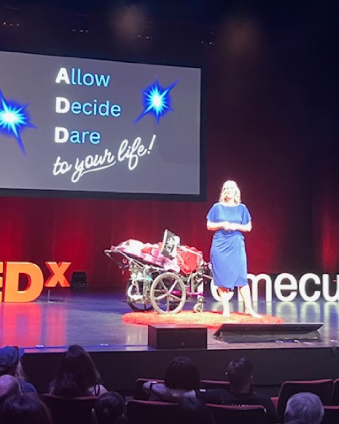 Kennedy and Jennifer on stage during their Tedx talk.